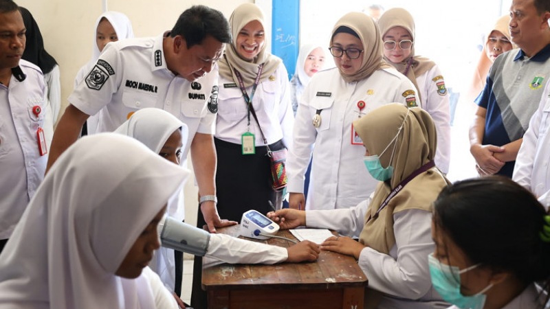 Bupati Tangerang, Maesyal Rasyid bersama Wakil Bupati Intan Nurul Hikmah meluncurkan dua program unggulan di bidang kesehatan: PKG dan Aksi Bergizi “GARASI” - Dok Prokopim Tangerang -
