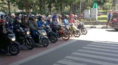 Ilustarasi kendaraan roda dua di jalan raya. (Foto: Repro)