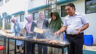 Pj Gubernur Banten Al Muktabar mengajak masyarakat Banten gemar makan ikan. (Foto: Repro)